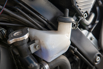 close up of coolant tank  of motorbike
