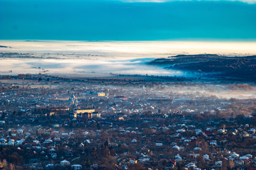 Morning city in the fog