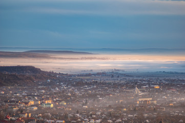 Fototapeta na wymiar Morning city in the fog