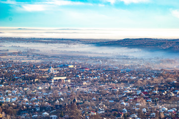 Morning city in the fog