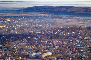 Naklejka premium Morning city in the fog
