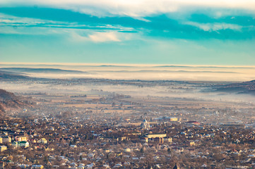 Naklejka premium Morning city in the fog