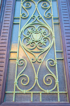 Window with metal railing decorated in Liberty style