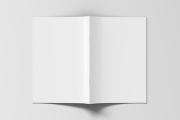 Brochure or booklet cover mock up on white. Brochure is open and upside down. Isolated with clipping path around brochure. View above. 3d illustratuion