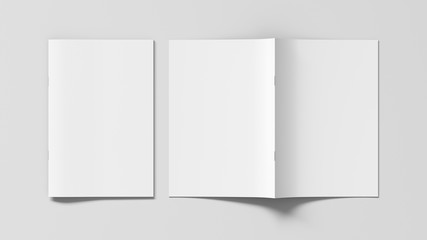 Vertical brochure or booklet cover mock up on white. Closed one brochure and upside down other. Clipping path around brochure. View above. 3d illustratuion