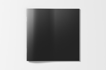 Black square brochure or booklet cover mock up on white. Isolated with clipping path around brochure. View above.  3d illustratuion