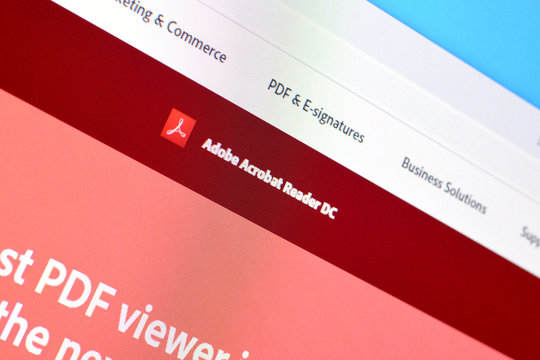 Web page of adobe acrobat reader product on official website on the display of PC