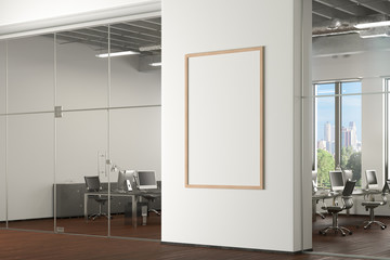 Blank vertical poster mock up on the white wall in office interior. 3d illustration