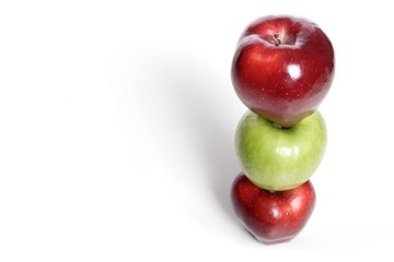 Photo of three apples in stack