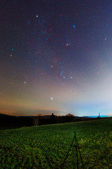 Winter night sky including Barnard’s Loop, the Orion Nebula, the Flame Nebula, the Rosette...