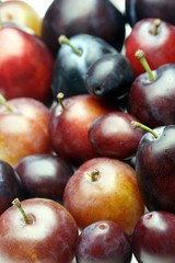 Plums on white bacground - close-up