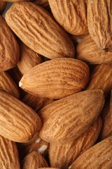 Almonds on white background - close-up