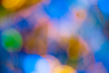 A colourful circular blurred bokeh background