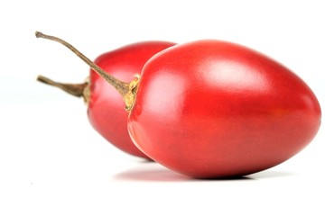 Close-up of tamarillo on white background