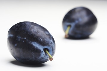 Plums on white bacground - close-up