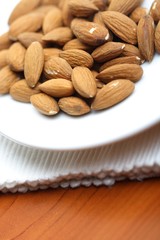 Close-up of almonds on white plate