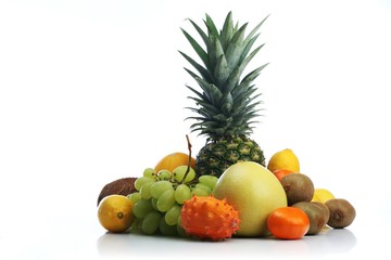 Composition of exotic fruits on white background