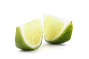 Lime slices on white background