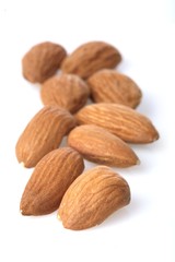 Almonds on white background - close-up