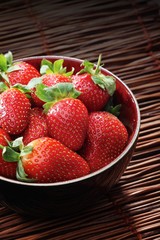 Strawbwrry on wooden background - close-up