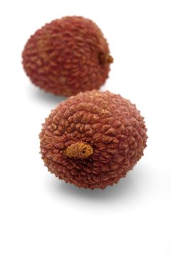 Lychee on white background - close-up