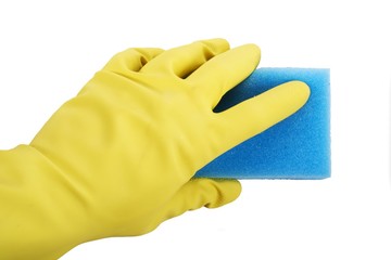 Hand in rubber gloves holding sponge