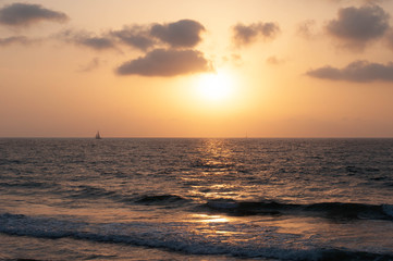 Bright sunset over the sea from the shore