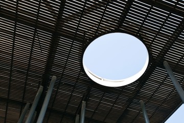 Circular hole in wooden walking deck