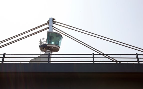 Close-up View Of A Control Tower On Top Of A Bridge
