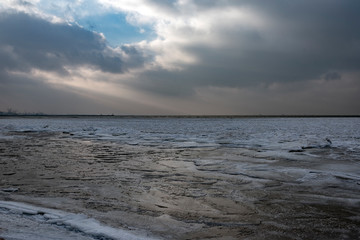 Fototapeta na wymiar Icy baltic sea coast in winter next to Liepaja, Latvia.