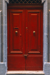Old vintage weathered wooden door of Malta