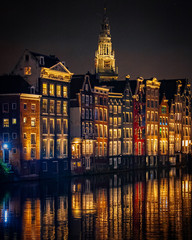 reflections in Amsterdam canals at night long exposure