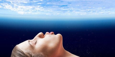 Fototapeta premium Girl kissing Earth planet . Mixed media