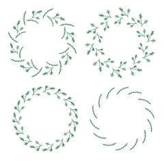 Four round frames made of fir and pine branches . Wreaths on white background for your design