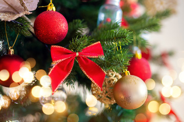 Christmas tree decoration. Red bow on a branch large.