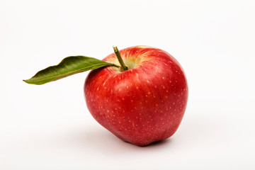red apple with leaf isolated on white