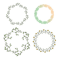 Four round frames made of green branches and different multicolor decorative elements. Wreaths on white background for your design