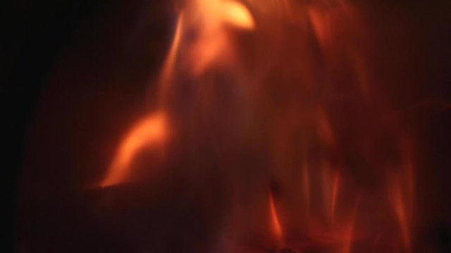 Flames Behind Smoky Glass