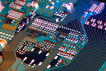 Electronic circuit board with electronic components such as chips close up. The concept of the...