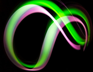 Long exposure light streaks on black background