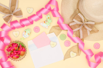 Happy Easter- Easter decoration on yellow background 