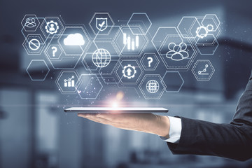 Businessman hand holding digital tablet