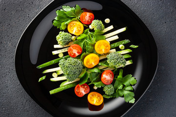 Vegetable salad with green onions and parsley