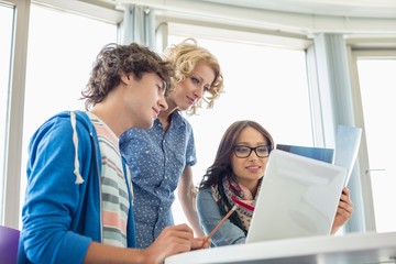 Creative businesspeople working in office