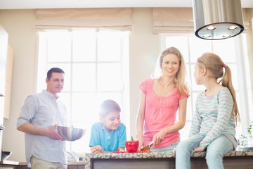 Fototapeta premium Family preparing food in kitchen