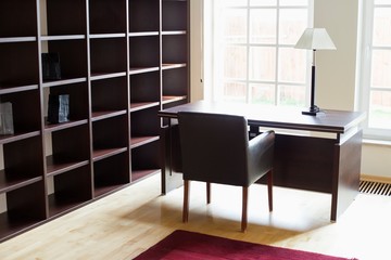 Empty wooden shelves in home office