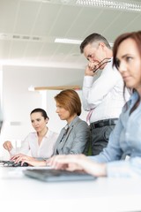 Business people working in office