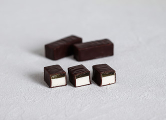 Souffle, jelly, souffle in chocolate, candy, chocolate candy with souffle, dessert, dessert in chocolate, fruit jelly, light background, sweets, Goodies, Goodies, loose, piece dessert, food, sweet foo