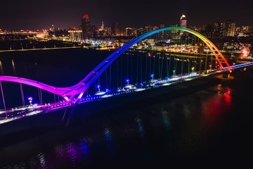 Crescent Bridge - landmark of New Taipei, Taiwan with beautiful illumination at night, photography in New Taipei, Taiwan.