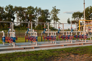 Fototapeta premium Gas industry, gas transport system. Gas pipeline. Gas pipes, stop valves and appliances for gas pumping station